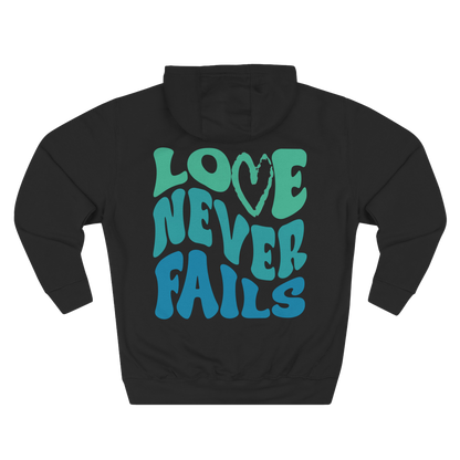 LOVE NEVER FAILS - HOODIE