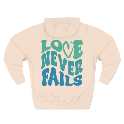 LOVE NEVER FAILS - HOODIE