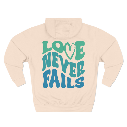 LOVE NEVER FAILS - HOODIE